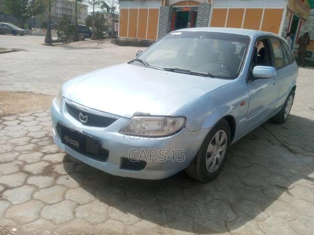 Mazda 323 2002 Blue