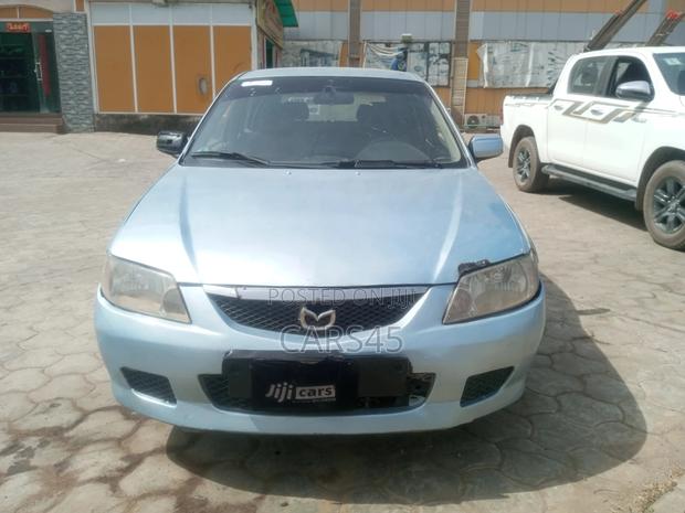 Mazda 323 2002 Blue