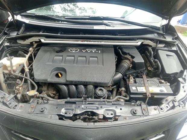 Toyota Corolla Base 4dr Sedan (1.8L 4cyl 5M) 2010 Black