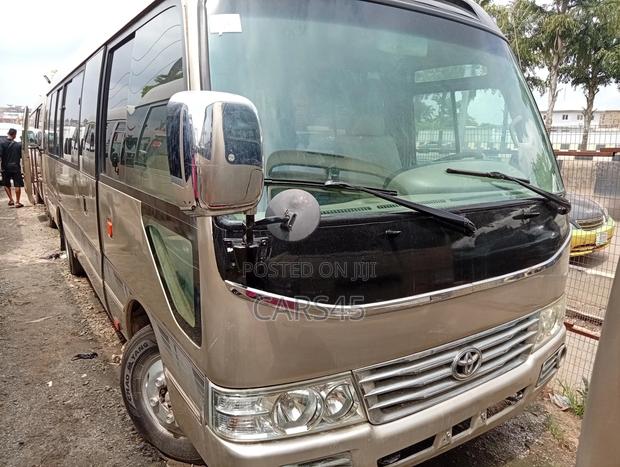 Toyota Coaster 2017 Gold