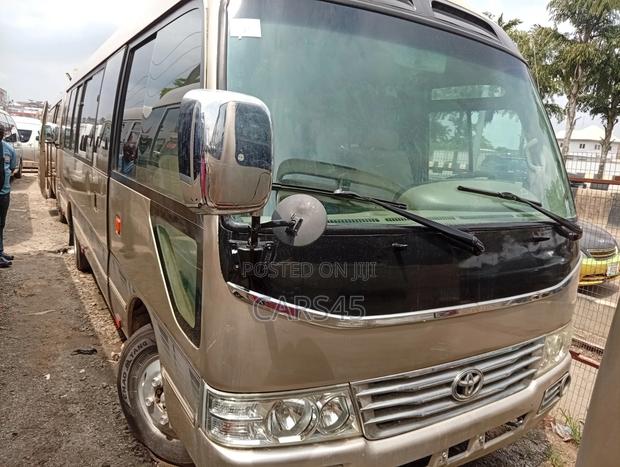 Toyota Coaster 2017 Gold