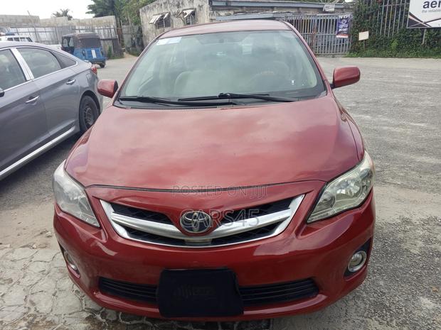 Toyota Corolla Base 4dr Sedan (1.8L 4cyl 5M) 2011 Red