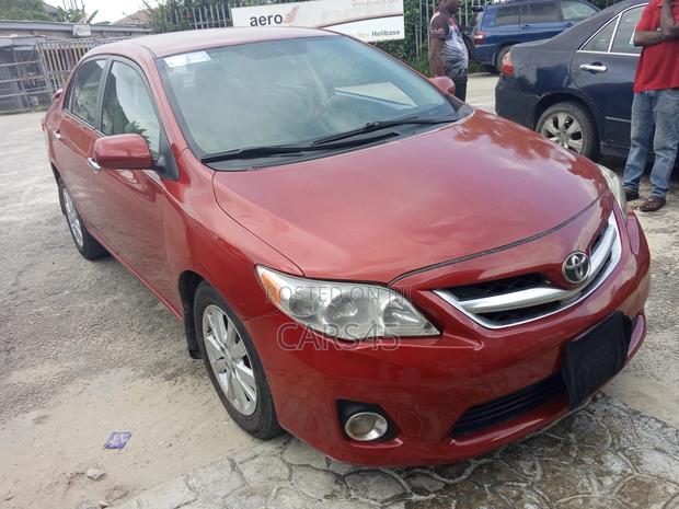 Toyota Corolla Base 4dr Sedan (1.8L 4cyl 5M) 2011 Red