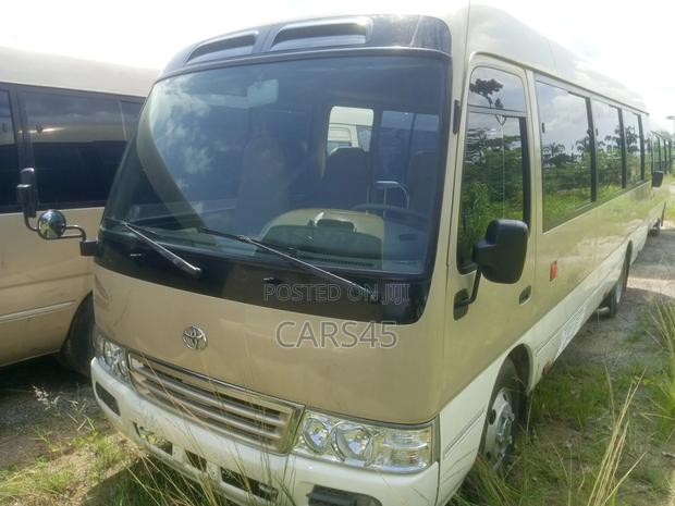 Toyota Coaster 2015 Gold