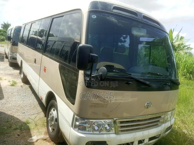 Toyota Coaster 2015 Gold