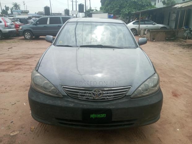Toyota Camry LE 4dr Sedan (2.4L 4cyl 5M) 2003 Beige