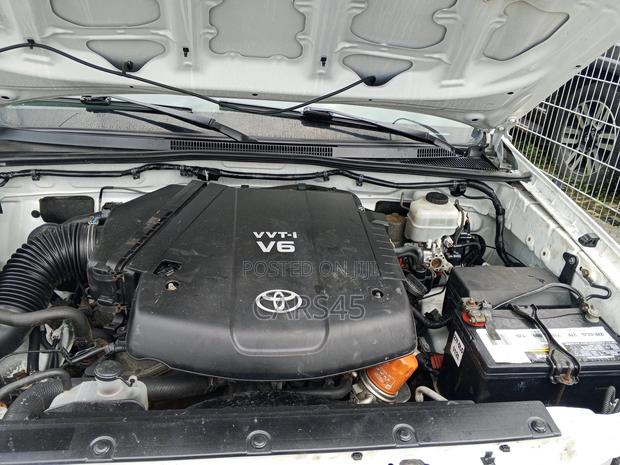 Toyota Tacoma Access Cab 4x4 2.7L 4-Cyl. 5-Speed Manual 2013 White