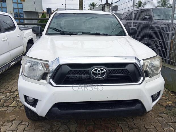 Toyota Tacoma Access Cab 4x4 2.7L 4-Cyl. 5-Speed Manual 2013 White