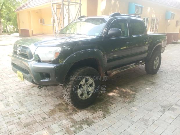 Toyota Tacoma 2dr Regular Cab 4WD 6.1 ft. SB (2.7L 4cyl 4A) 2014 Gray