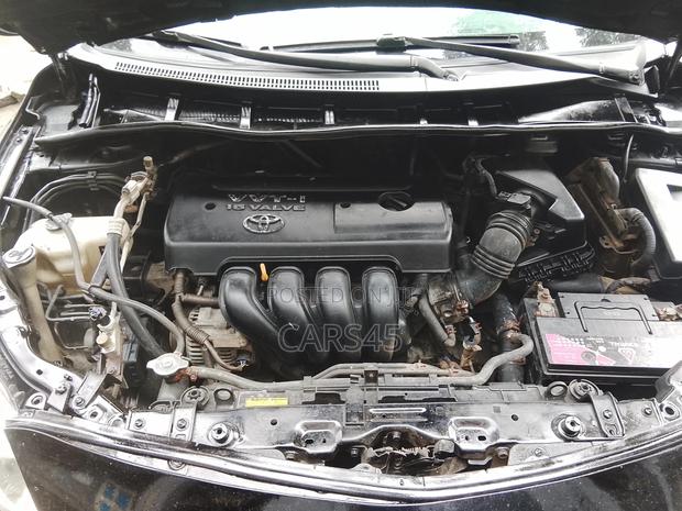 Toyota Corolla Base 4dr Sedan (1.8L 4cyl 5M) 2010 Black