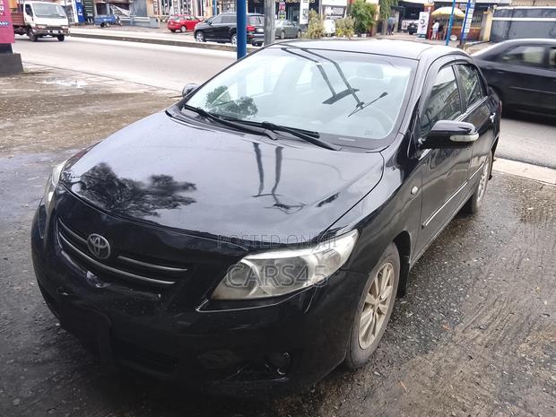 Toyota Corolla Base 4dr Sedan (1.8L 4cyl 5M) 2010 Black