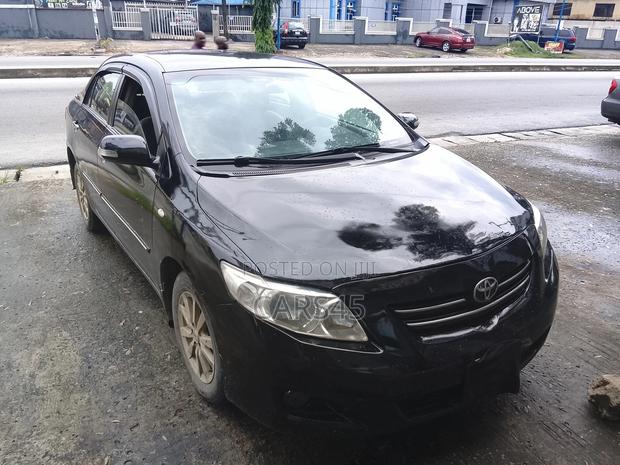 Toyota Corolla Base 4dr Sedan (1.8L 4cyl 5M) 2010 Black