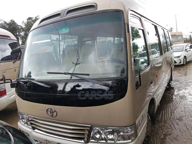 Toyota Coaster 2018 Gold