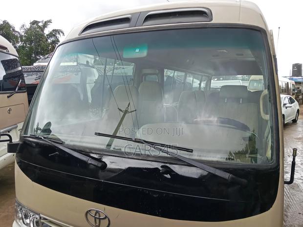 Toyota Coaster 2018 Gold