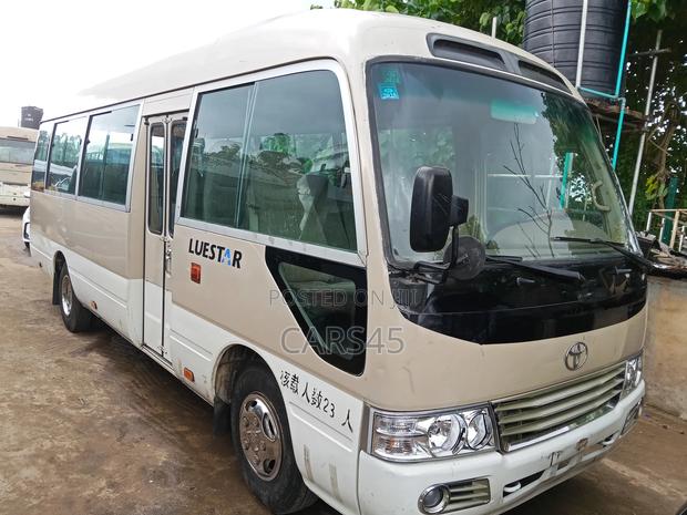 Toyota Coaster 2018 Gold