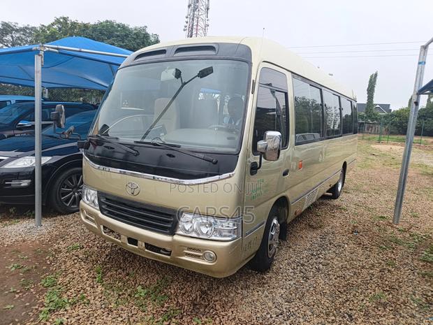 Toyota Coaster 2015 Gold
