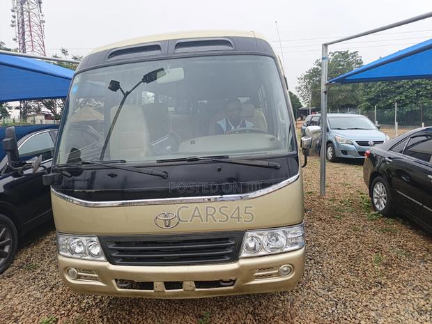 Toyota Coaster 2015 Gold