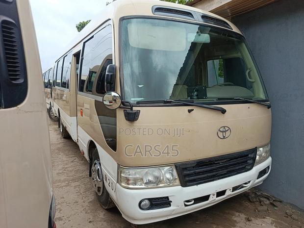 Toyota Coaster 2018 Beige