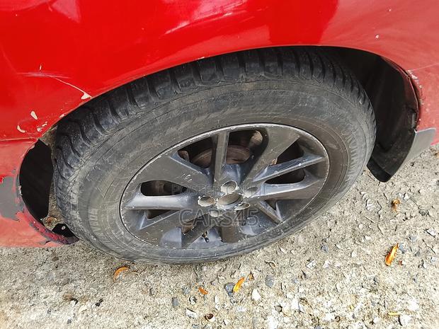 Toyota Matrix Hatchback AWD (1.8L 4cyl 4A) 2006 Red