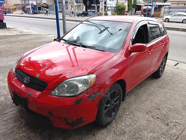 Toyota Matrix Hatchback AWD (1.8L 4cyl 4A) 2006 Red