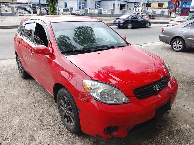 Toyota Matrix Hatchback AWD (1.8L 4cyl 4A) 2006 Red