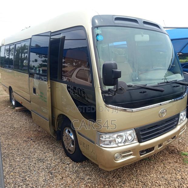 Toyota Coaster 2015 Gold