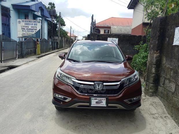Honda CR-V Touring 4dr SUV AWD (2.4L 4cyl CVT) 2015 Brown