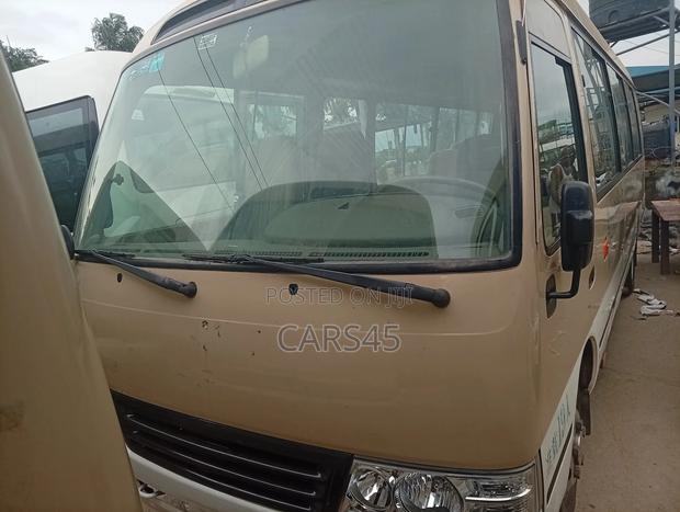 Toyota Coaster 2017 Gold