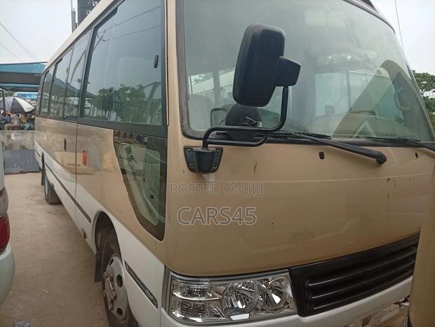 Toyota Coaster 2017 Gold