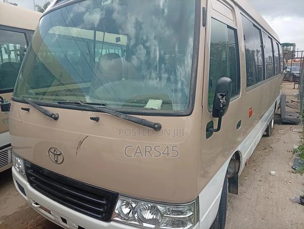 Toyota Coaster 2017 Gold