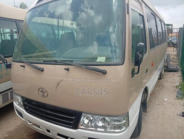 Toyota Coaster 2017 Gold