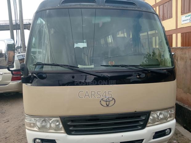 Toyota Coaster 2014 Beige