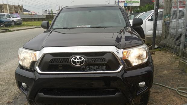 Toyota Tacoma V6 4dr Access Cab 4WD 6.1 ft. SB (4.0L 6cyl 5A) 2014