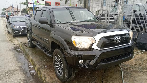 Toyota Tacoma V6 4dr Access Cab 4WD 6.1 ft. SB (4.0L 6cyl 5A) 2014