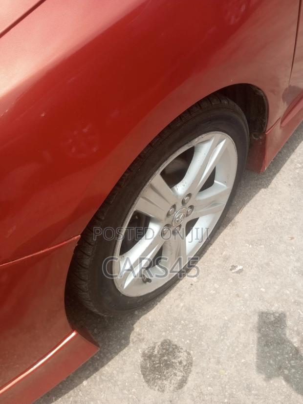 Toyota Corolla L 4dr Sedan (1.8L 4cyl 5M) 2013 Red