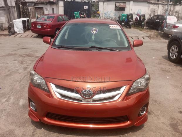 Toyota Corolla L 4dr Sedan (1.8L 4cyl 5M) 2013 Red