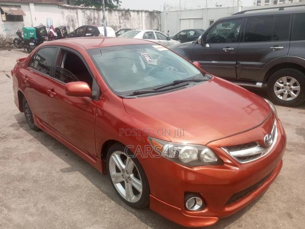 Toyota Corolla L 4dr Sedan (1.8L 4cyl 5M) 2013 Red